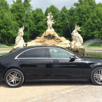 Mercedes in front of fountain